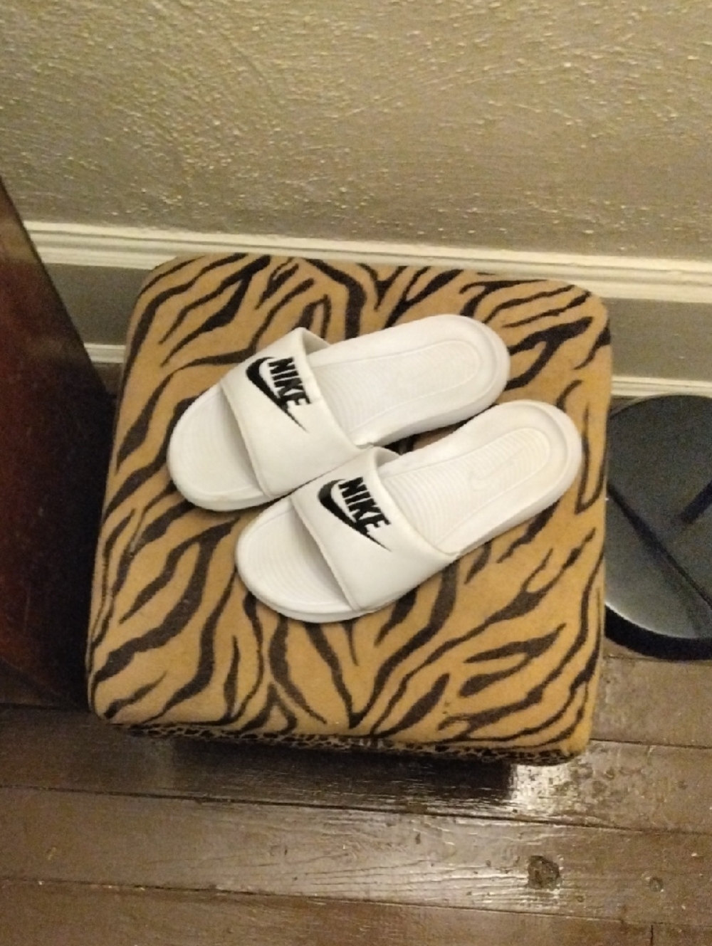 Nike White Slides with Black Logo Strap